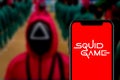Smartphone with the logo of `The Squid Game